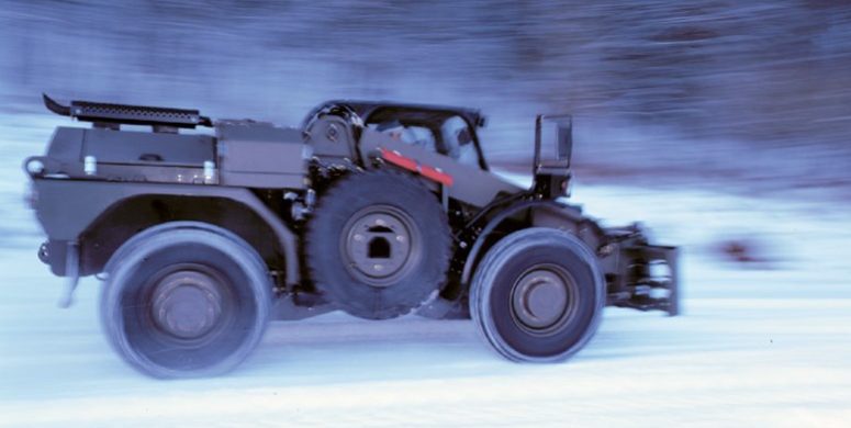 JCB P111 driving in the snow