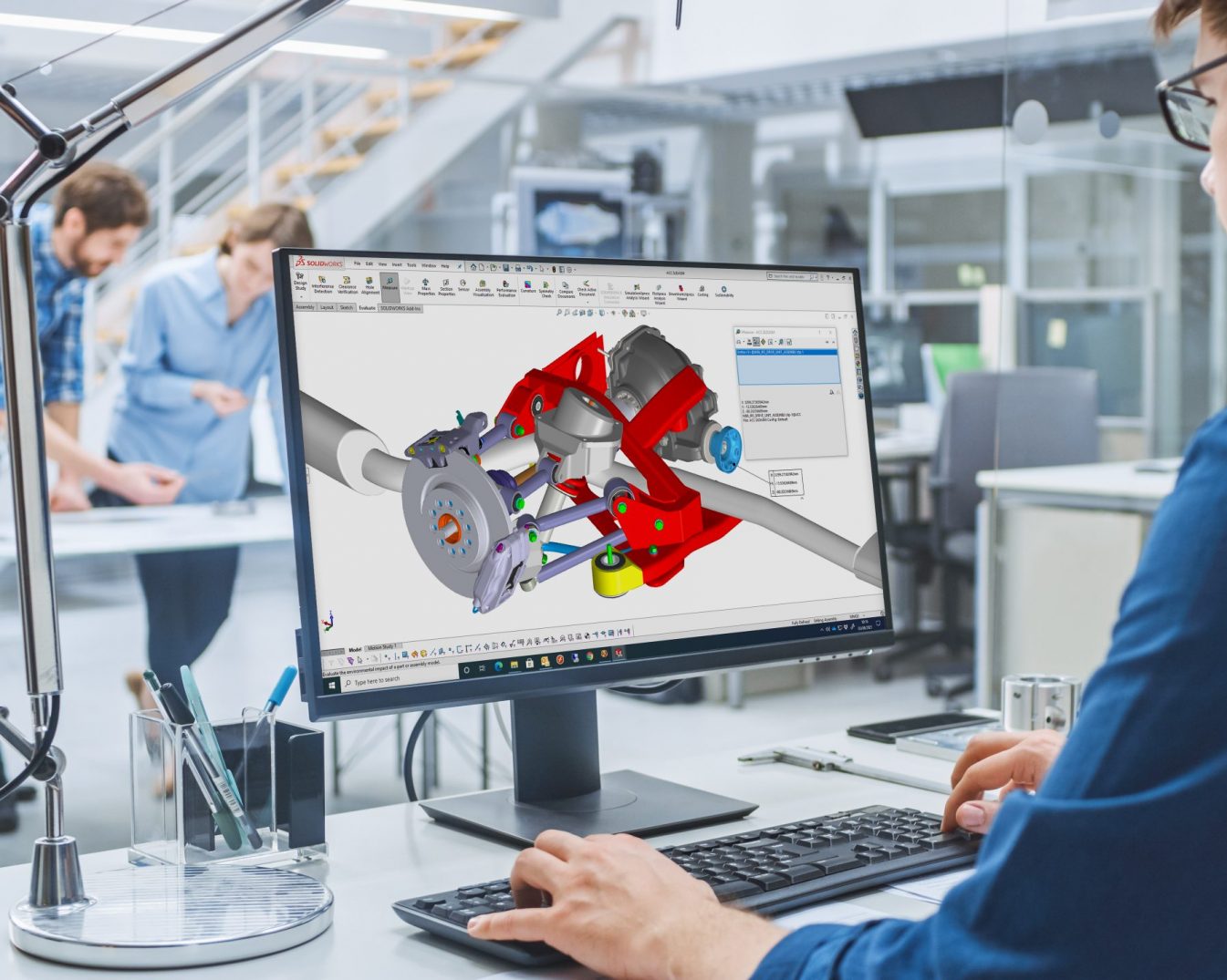 An engineer viewing a render of a suspension system